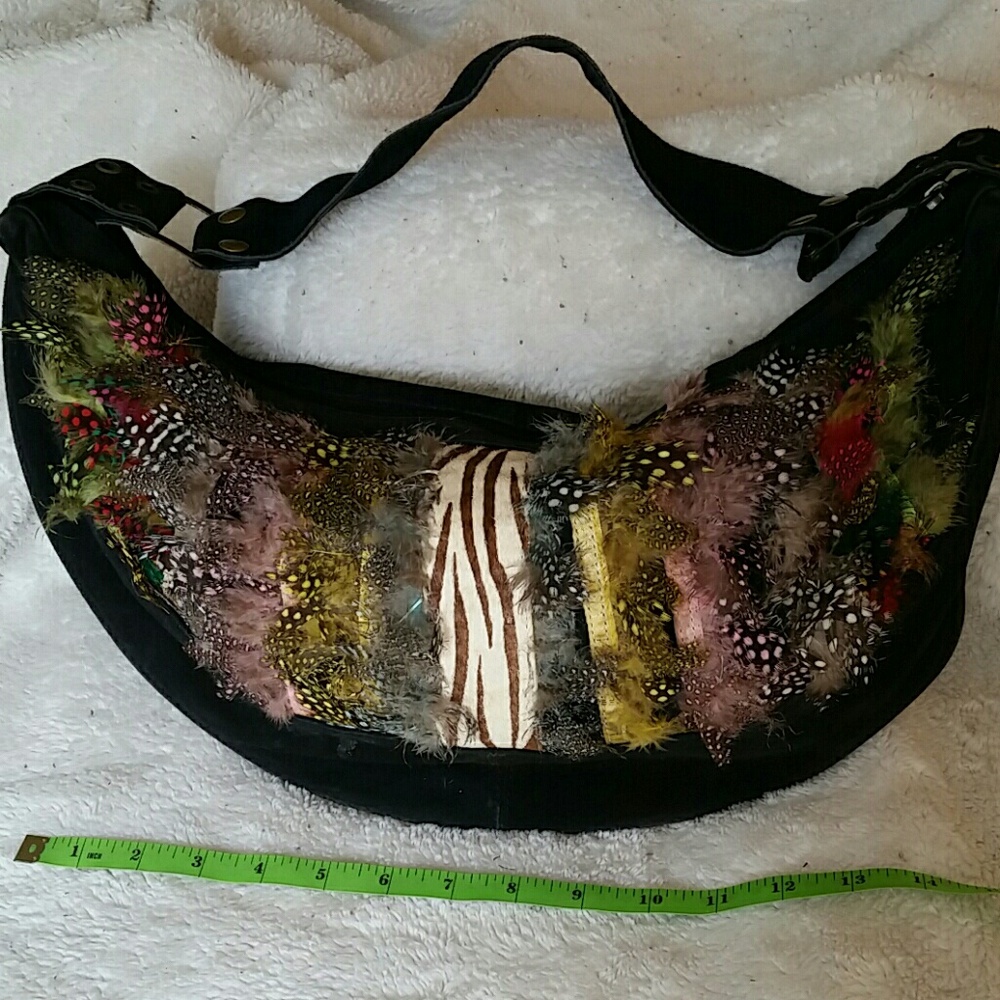 Suede and fearher purse